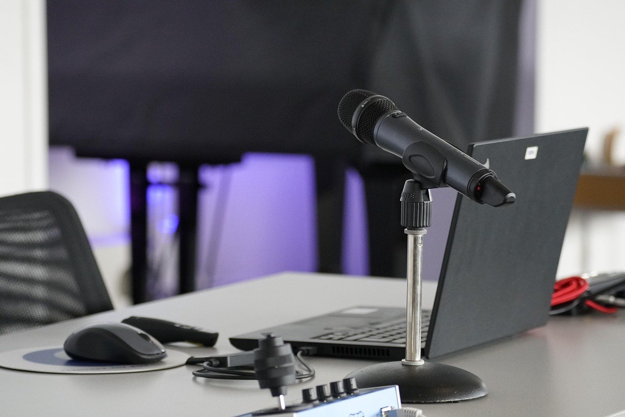 Professional attending online meeting on laptop